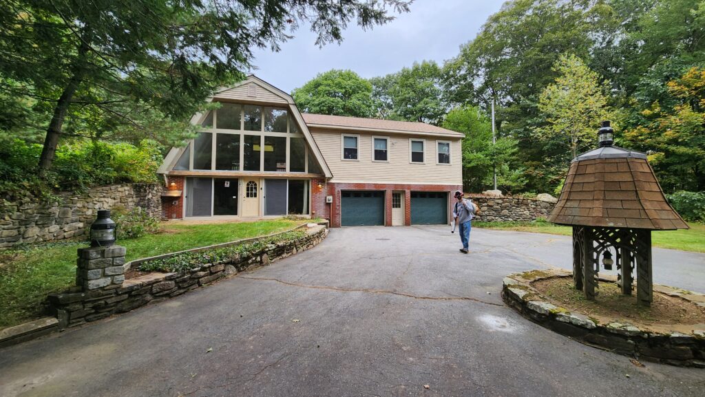 Phil leaf blowing driveway