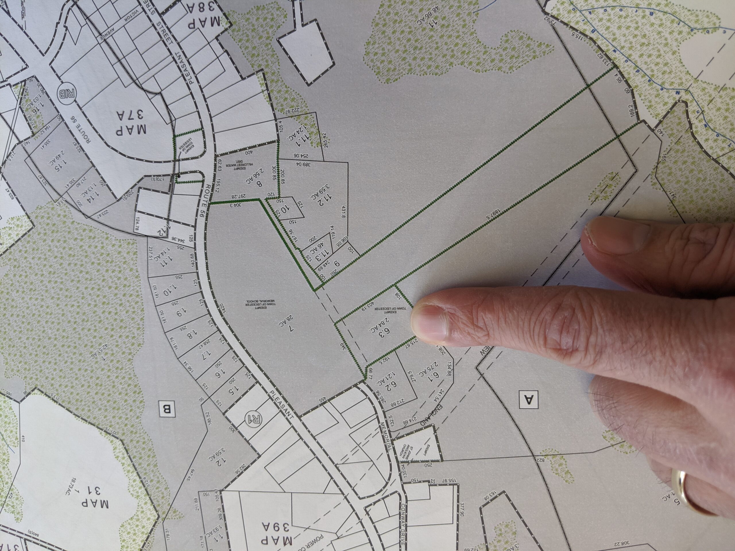 finger pointing to property map