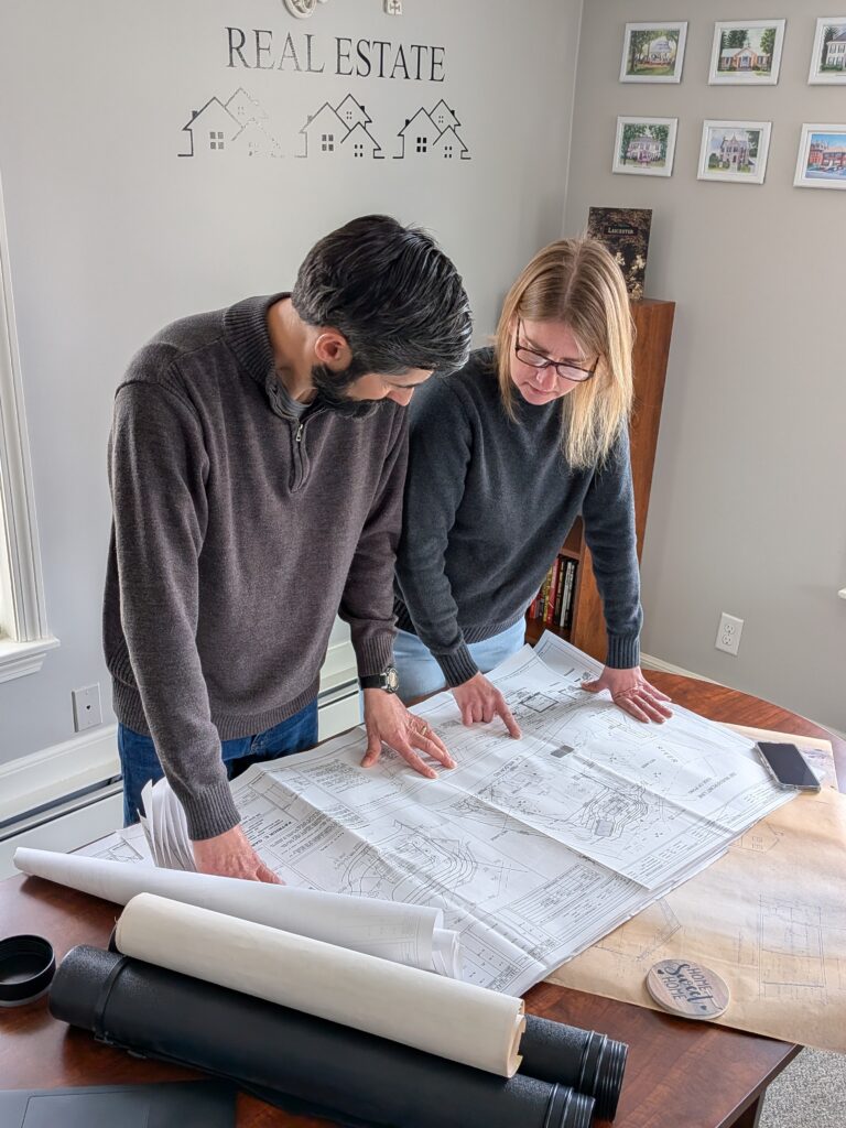 Phil & Heidi planning in office